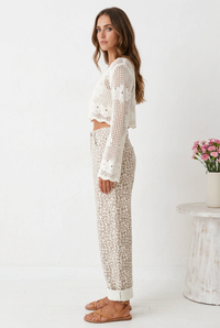 Thumbnail for Full-length side view of leopard-print jeans